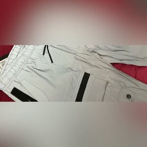 American Stich silver waterproof pants.
Size large.